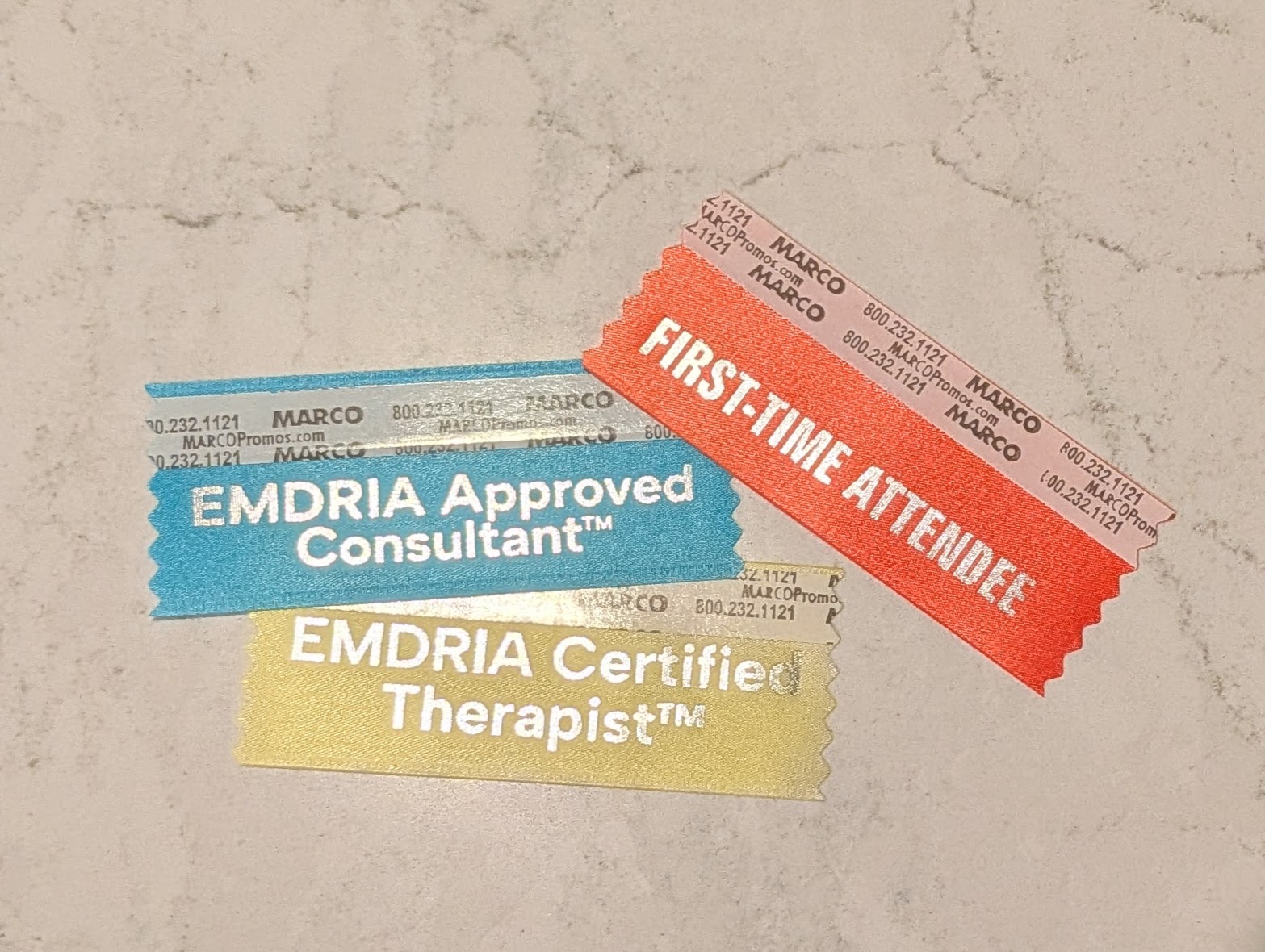 3 badges for approved consultant, emdria certified therapist, and 1st time conference attendee
