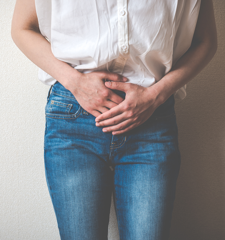 Women holding lower abdominal pain