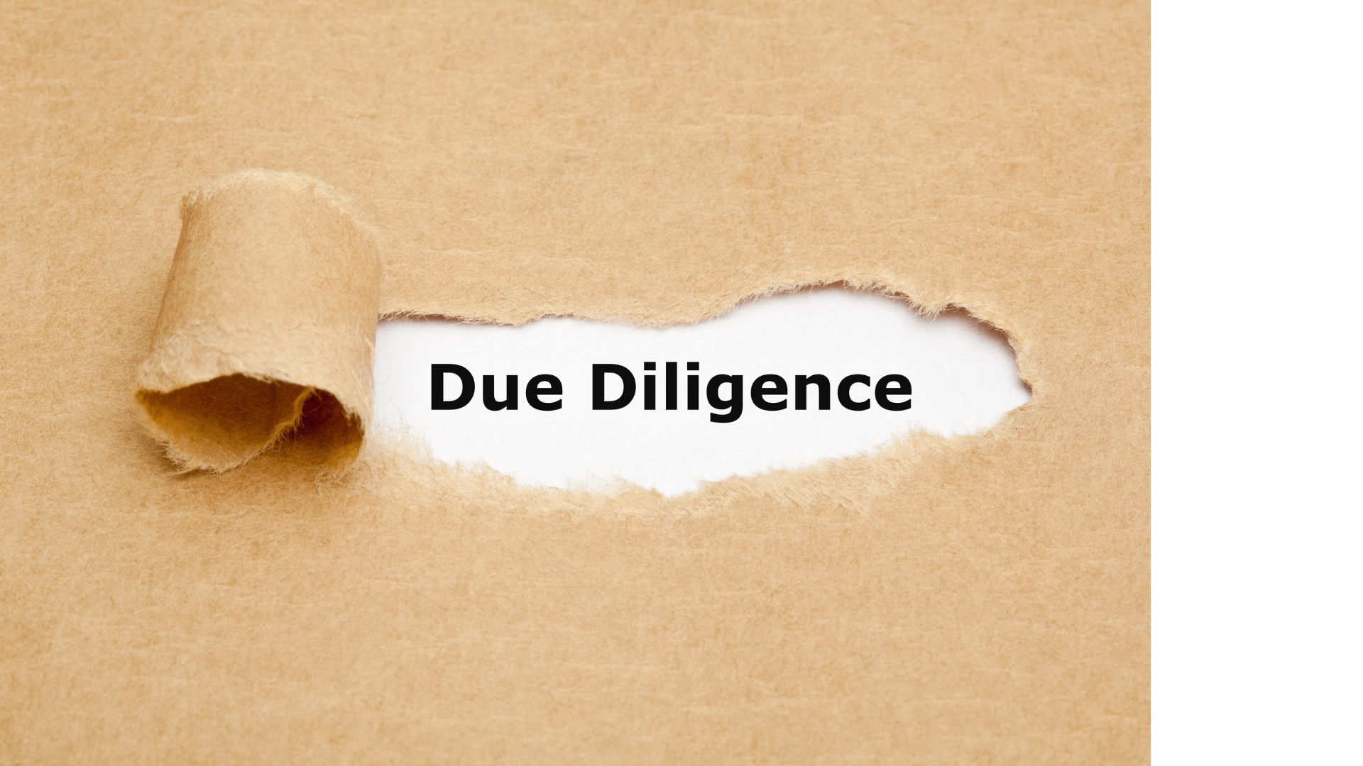 brown paper with a section pulled back to reveal the words Due Diligence in a typed font