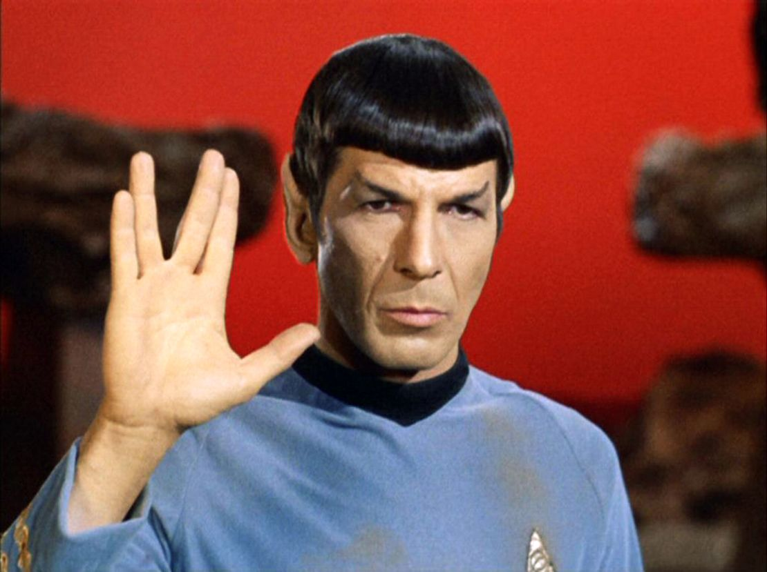 Mr. Spock with Vulcan hand salute.