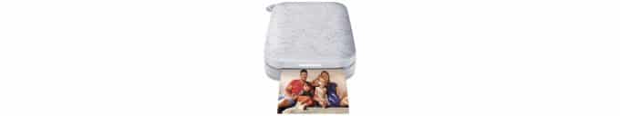 Silver speckled small printer with an image of a family of 4.