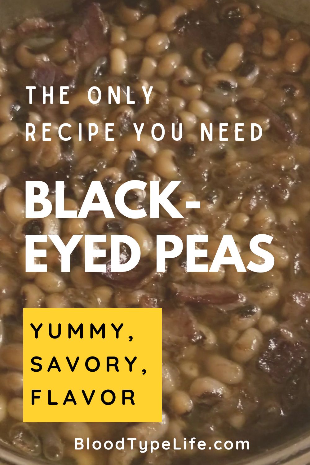 a bowl of black eyed-peas with beef sitting on a red and white picnic table