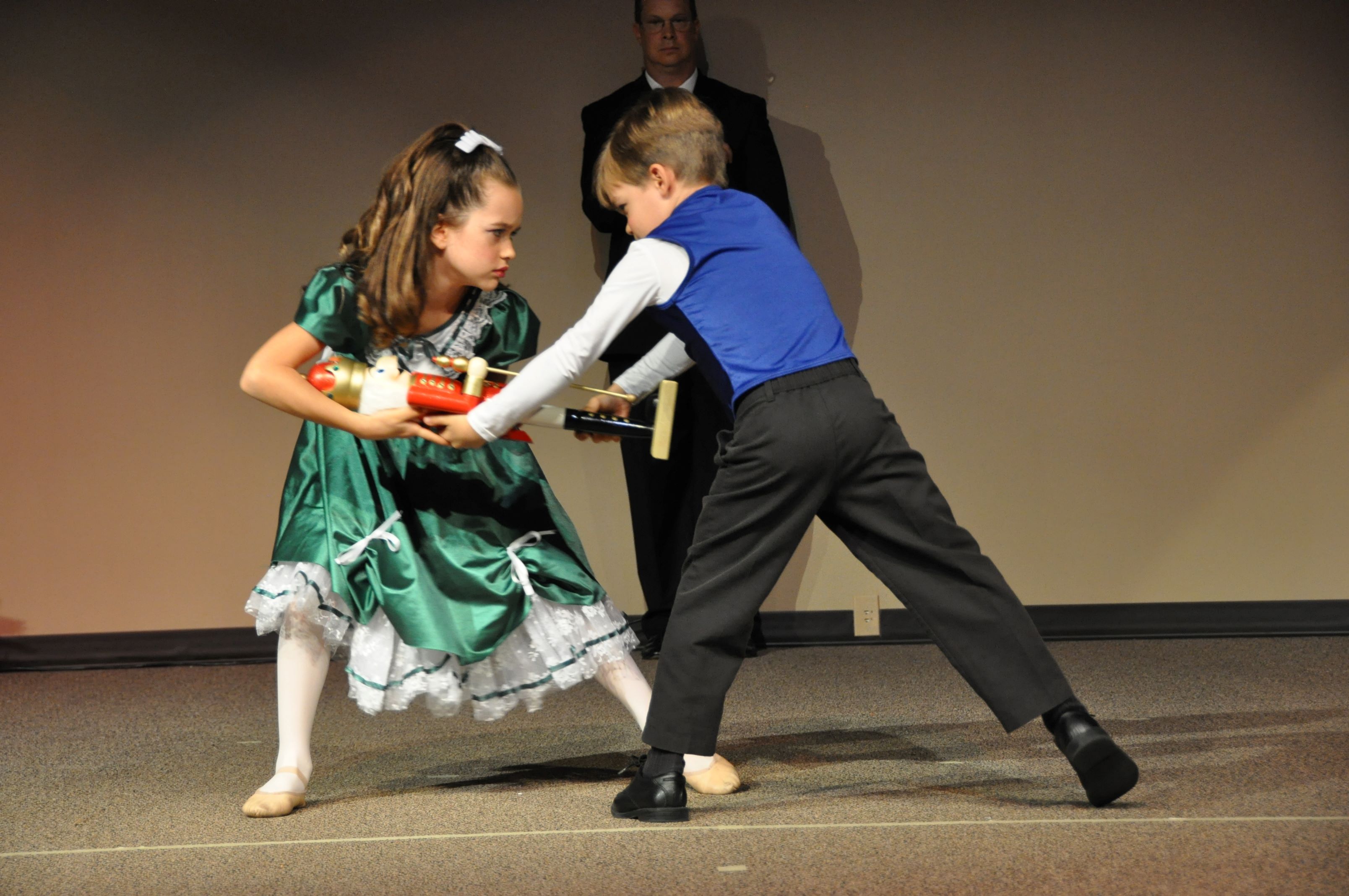 Our Nutcracker Story - Clara and Fritz fighting over the Nutcracker - homeschooldrama.com