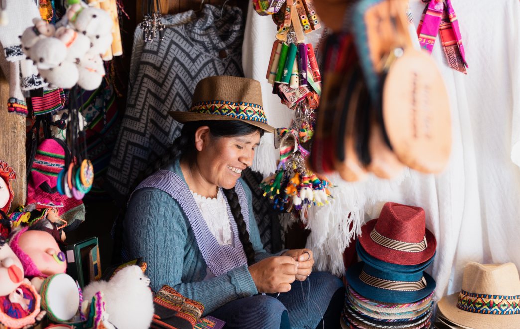 Cultural Immersion travel experience showing travelers engaging with locals and everyday life