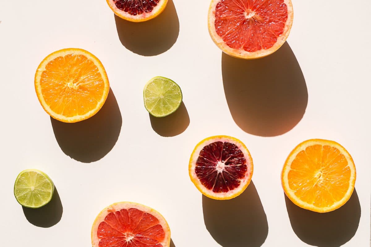 Slices of fruit all different variety and size. Example of still life photography using oranges, limes, grapefruit, and blood oranges.