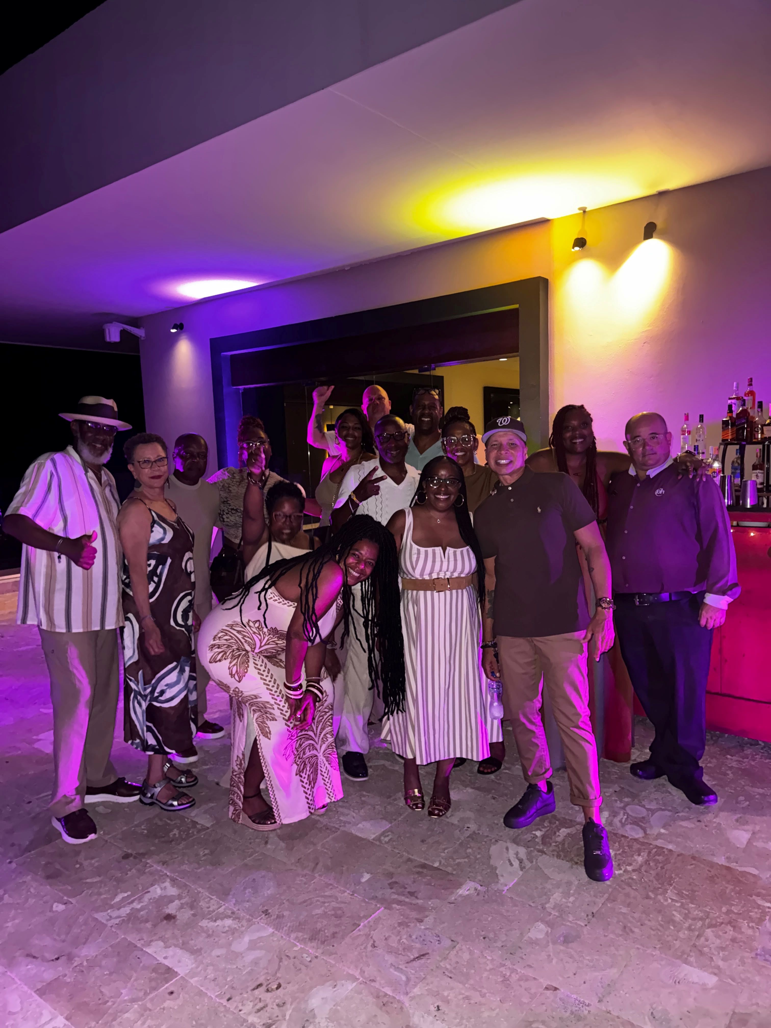 group celebrating at the S&S Bash earth-tone party