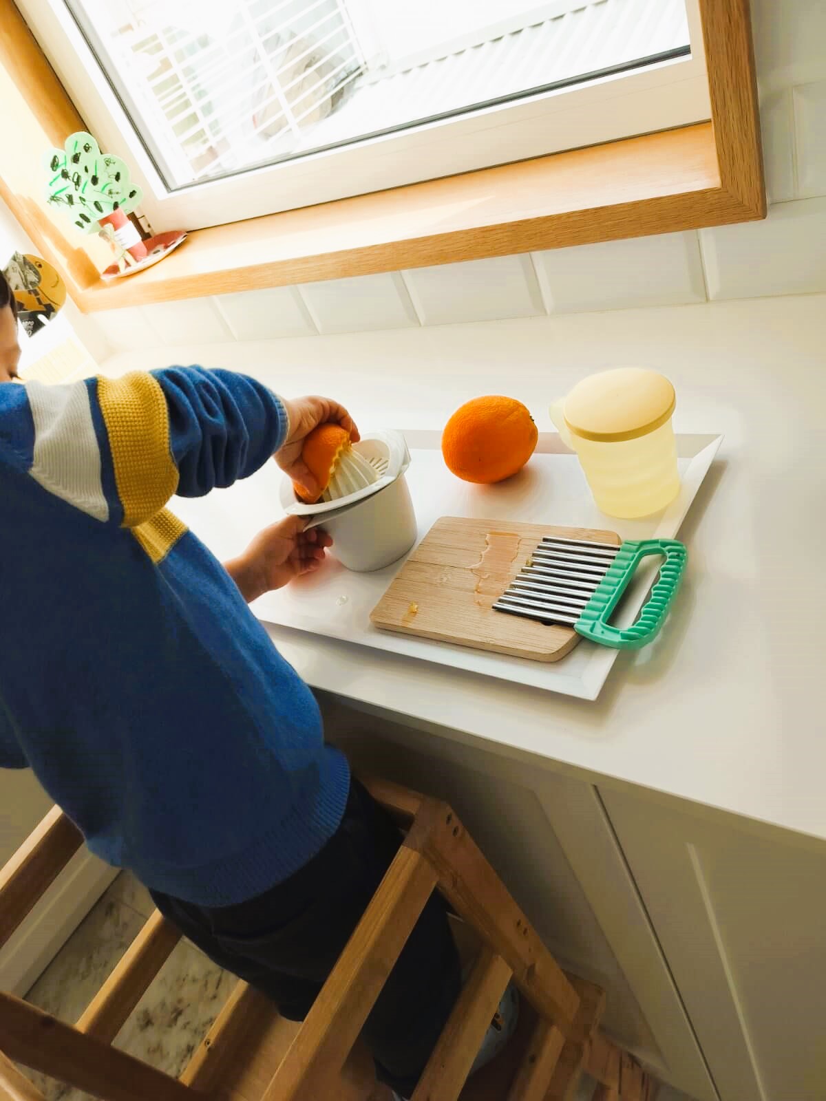 citrus squeezing montessori