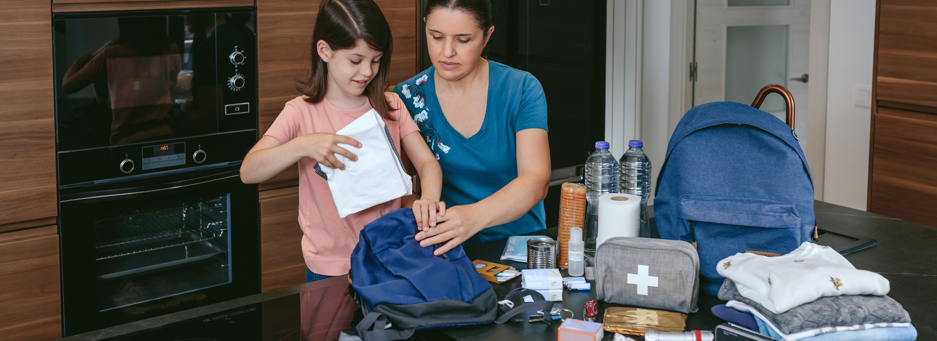 Family creating their disaster kit