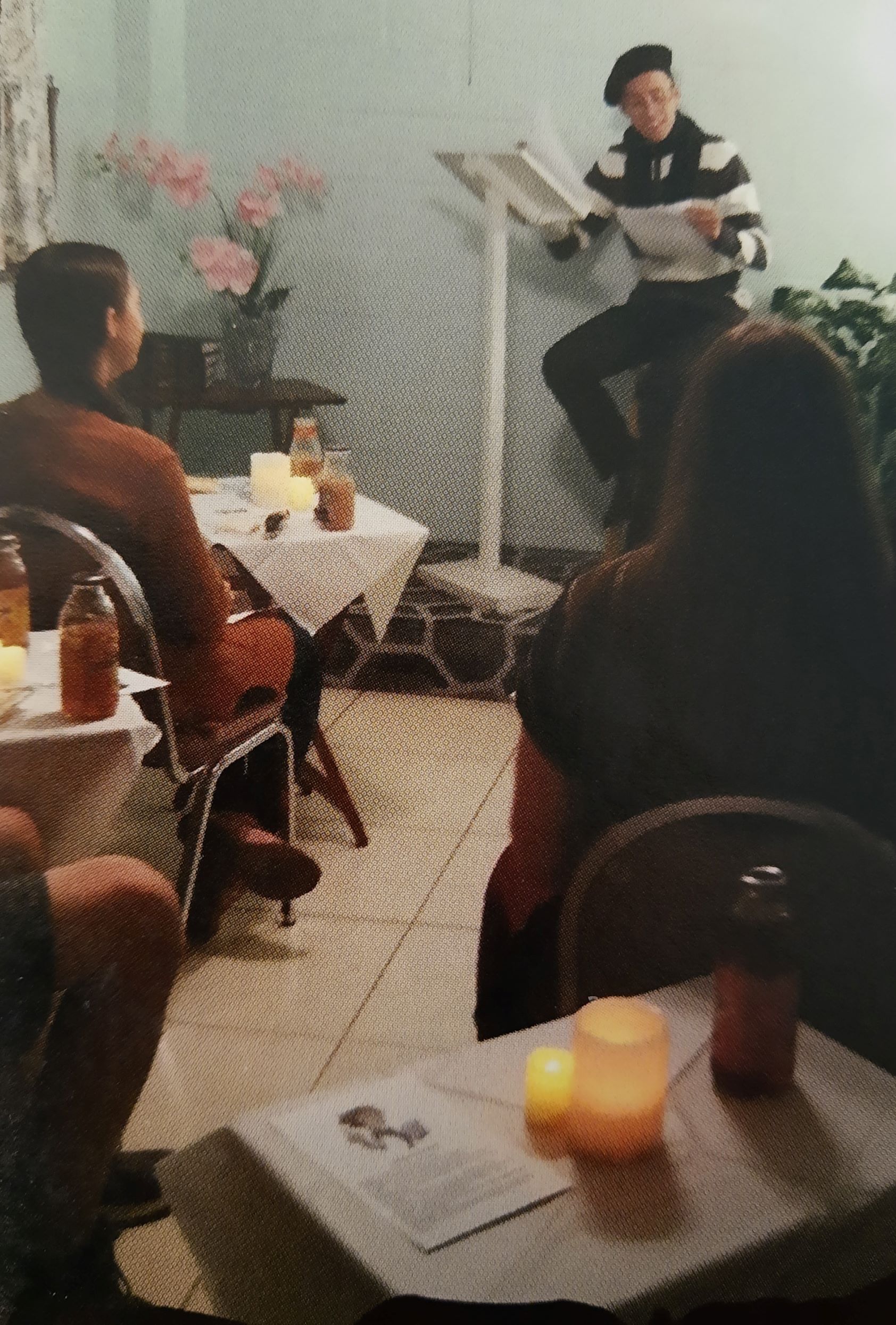 Students presenting with dramatic flair at a poetry cafe - homeschooldrama.com