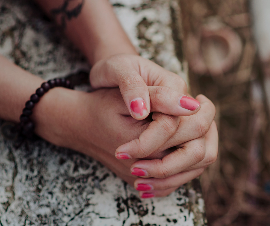 Clasped Hands with the left thumb on top