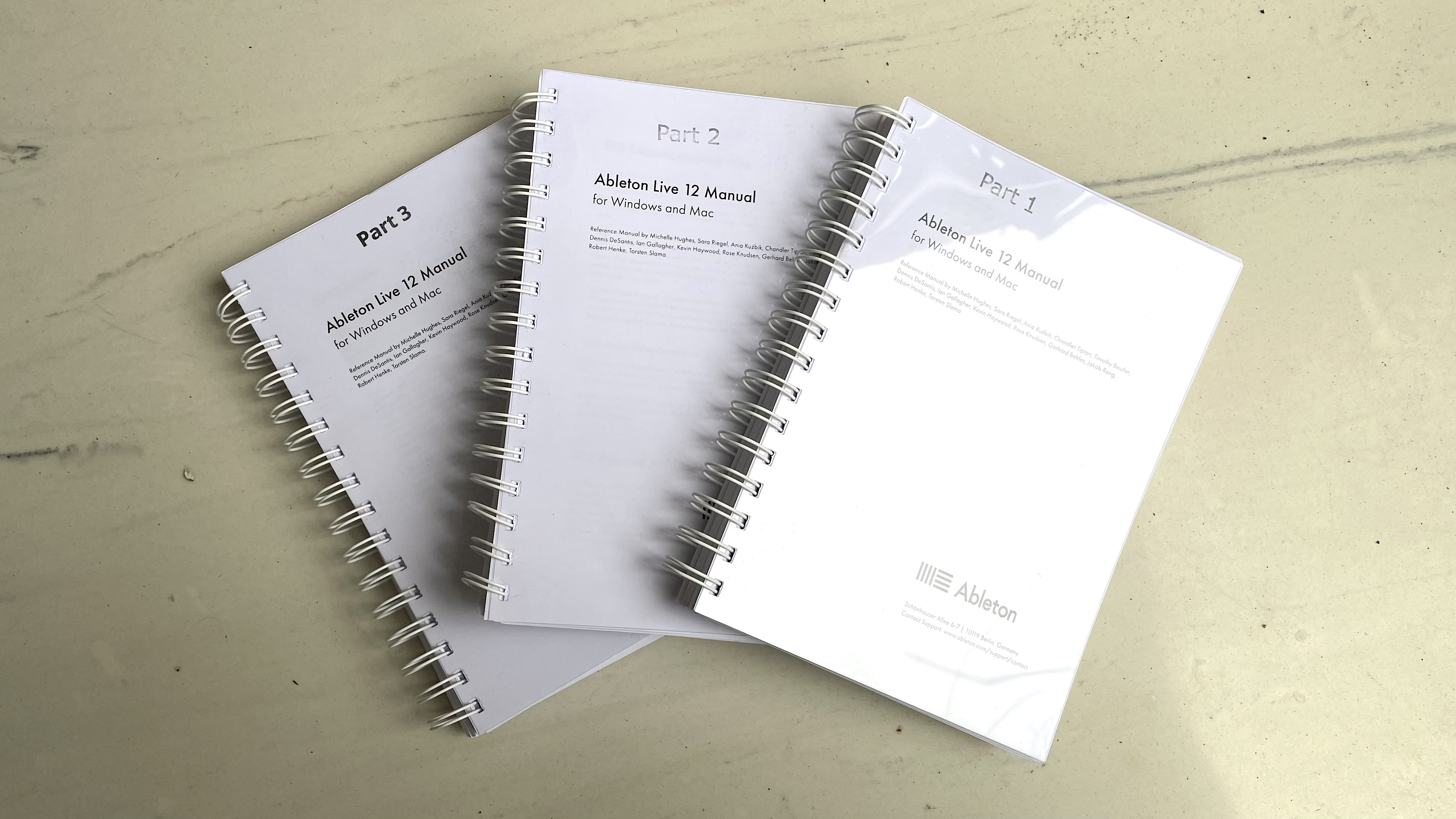 a photo of the ableton 12 manual in three volumes