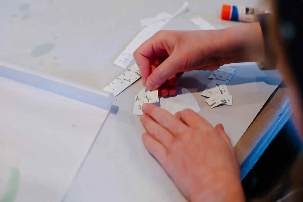 Gluiing wigwam birchbark - a creative activity for teaching THE BIRCHBARK HOUSE by Louise Erdrich - designed by LitWits Workshops