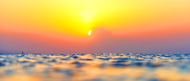 Sunset behind a cloud