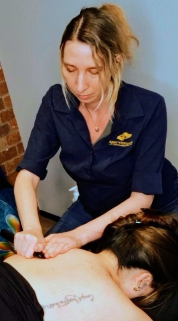 Therapist Khloe working on fascia