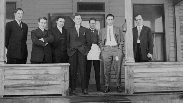 Reuter, Men on Porch 2