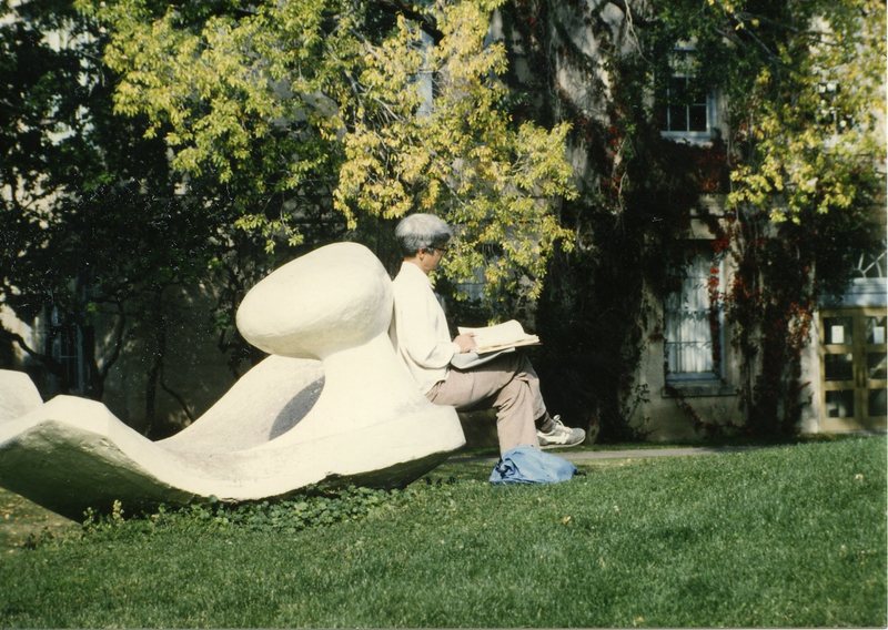 90's Employee, Reading Outdoors