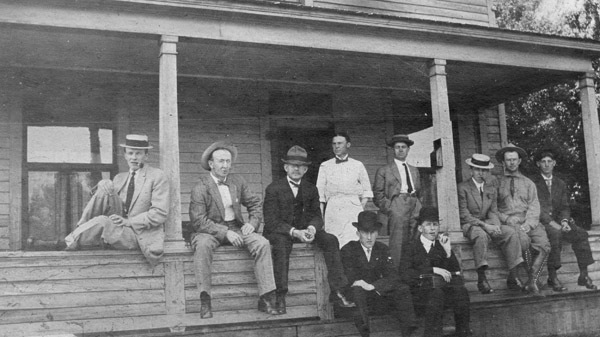 Reuter, Men on Porch 3