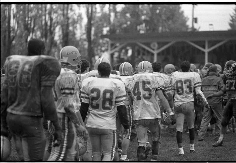 1990 Football Action, EOSC at Pacific University, Muddy 01
