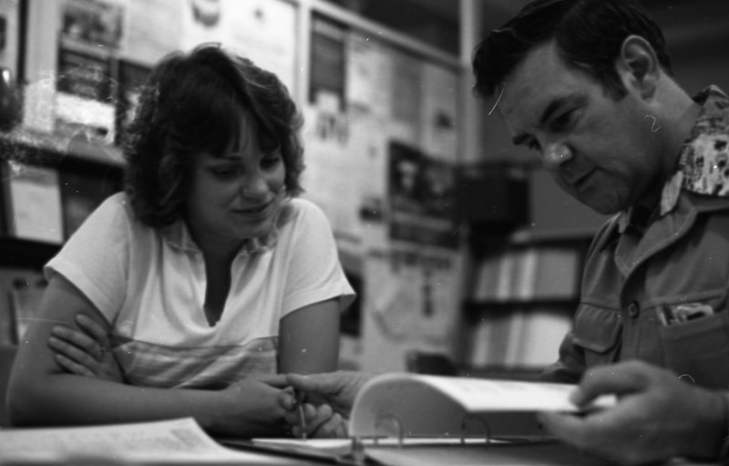 1980 Student, Consults Professor 01