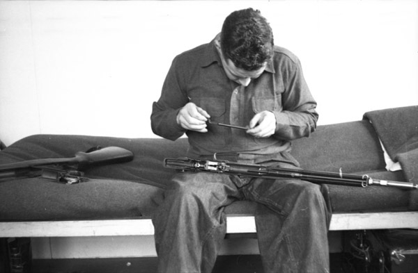 Soldier Cleaning Rifle 1