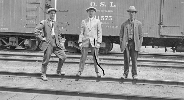 Reuter, Men on Train Tracks