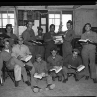 Engineering Crew Holds Manuals