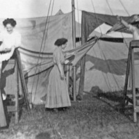 Reuter, Women Hang Tents
