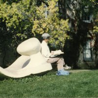 90's Employee, Reading Outdoors