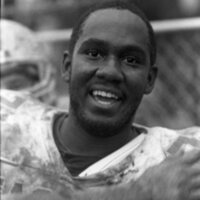 1990 Football Action, EOSC at Pacific University, Muddy 03