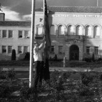 1977 Flags Being Hung