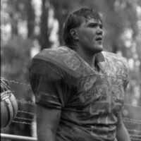 1990 Football Action, EOSC at Pacific University, Muddy 05