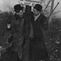 Reuter, Men on Sign