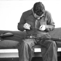 Soldier Cleaning Rifle 1