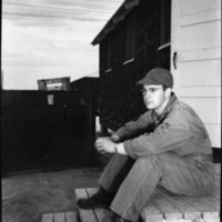 Fred Hill Seated on Steps