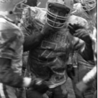 1990 Football Action, EOSC at Pacific University, Muddy 04