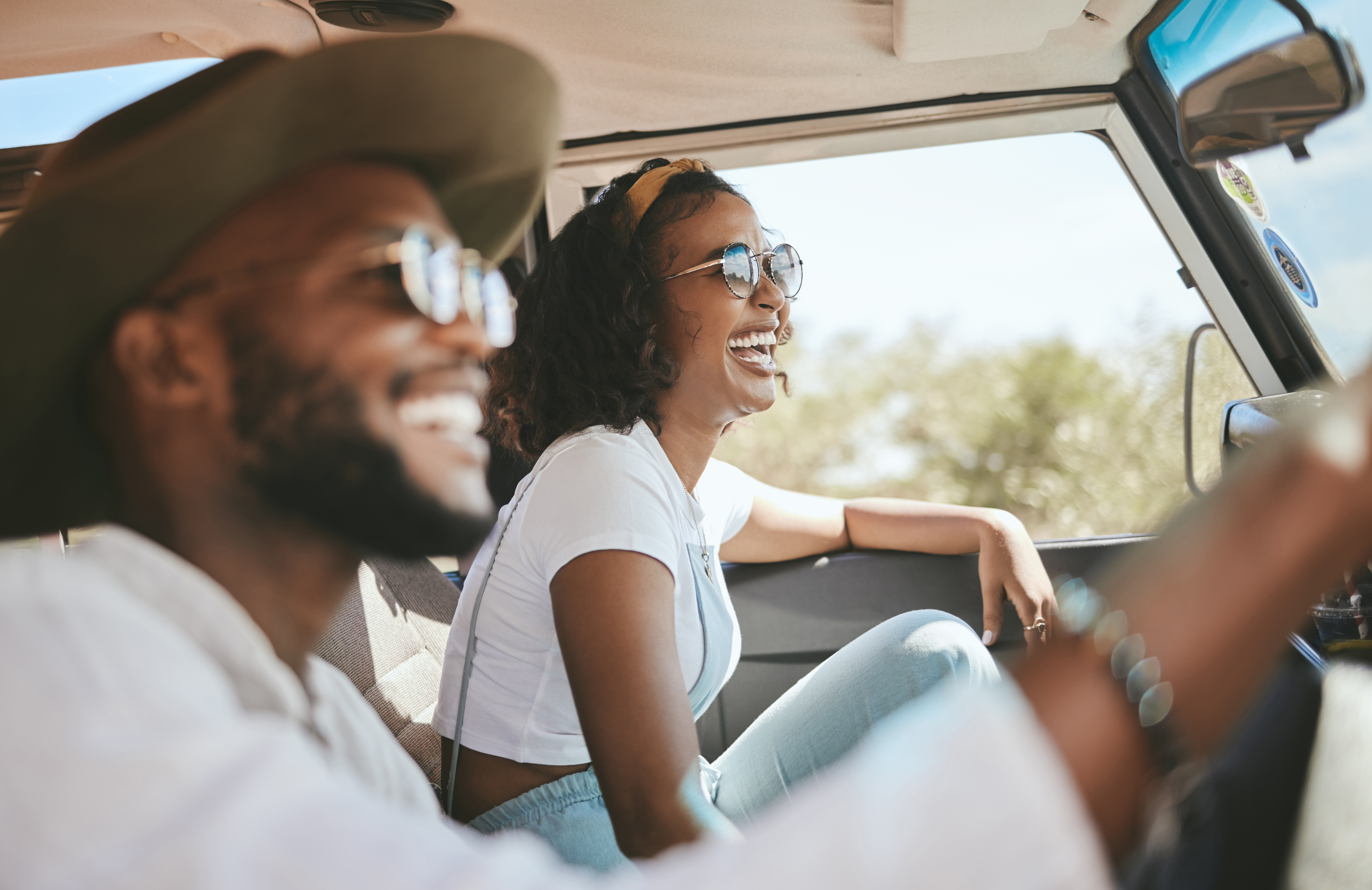 couple happy in car