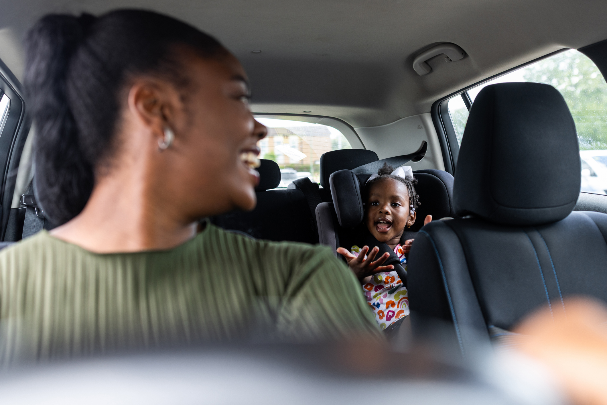 couple happy in car