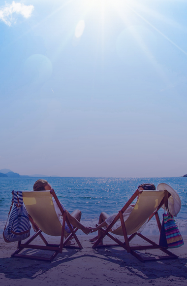 couple relaxing on beach