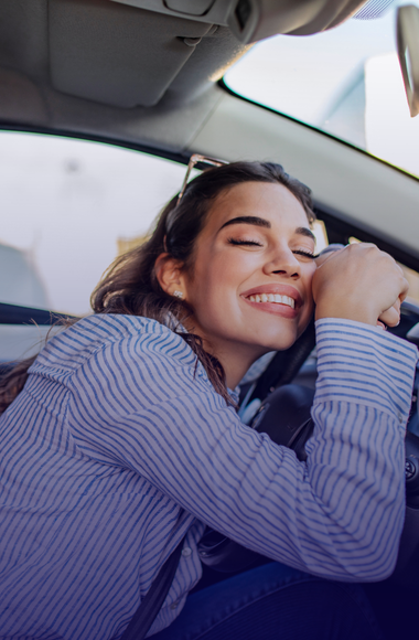 person happy to be in car