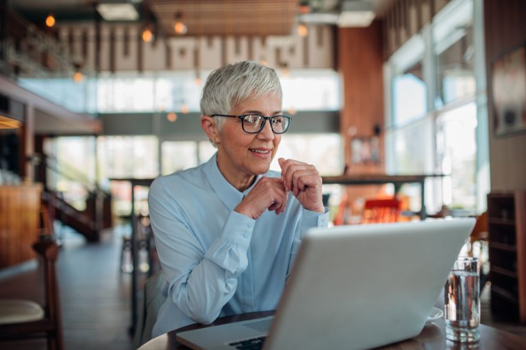 empowered person looking at bills