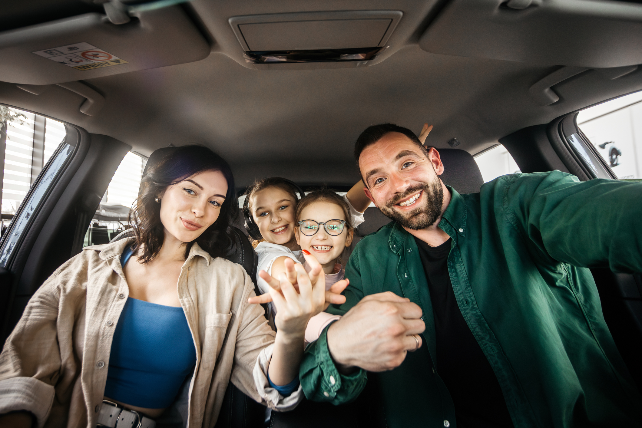 happy family in car