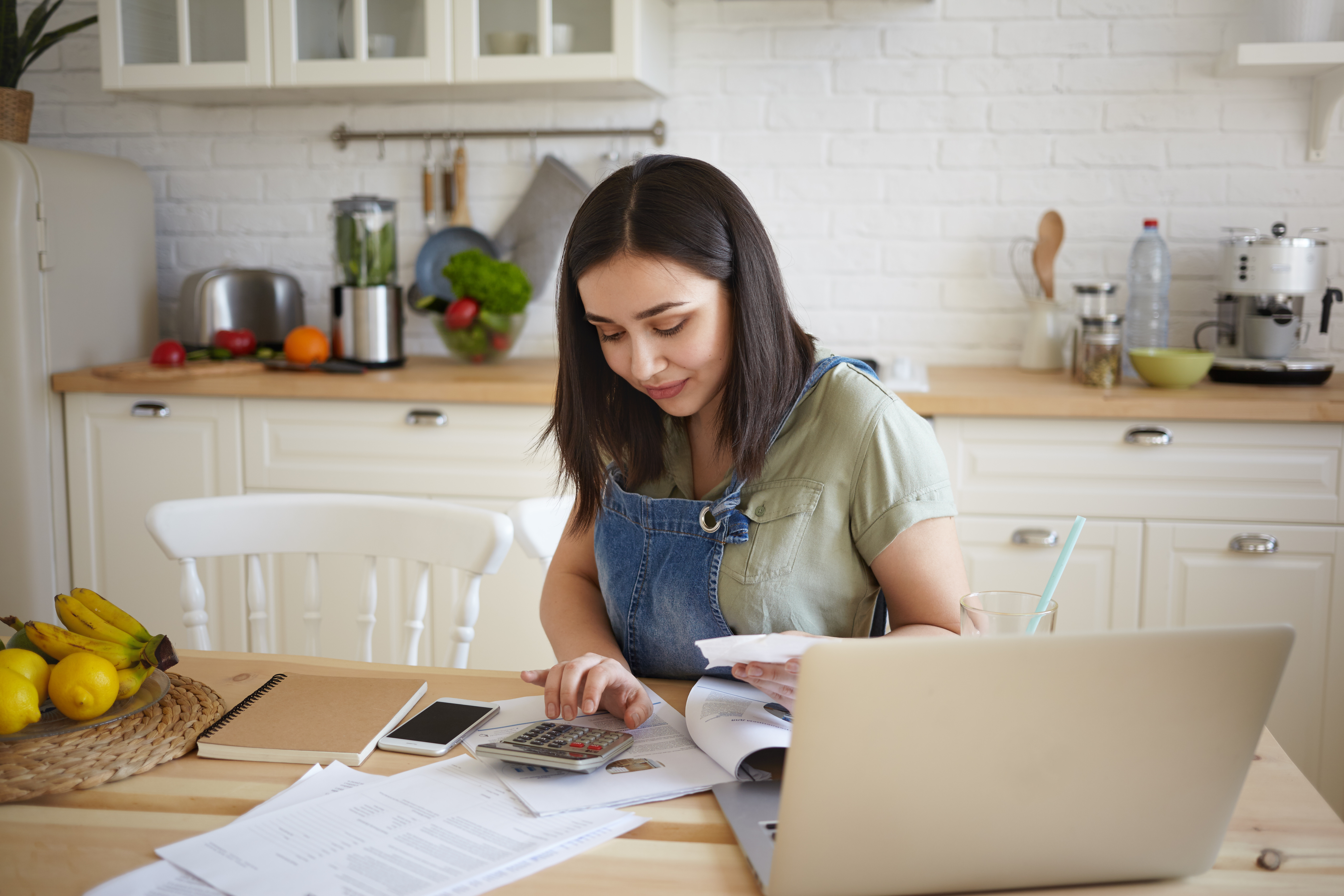 empowered person looking at bills