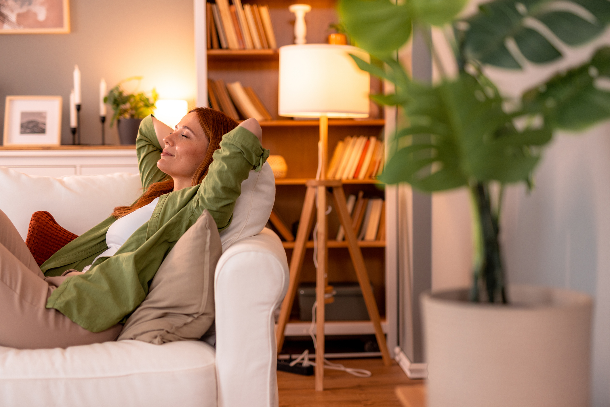 person with peace of mind relaxing on couch