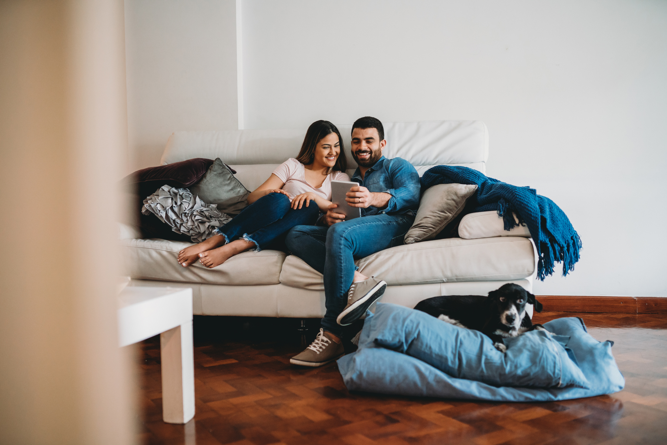 empowered couple looking at computer