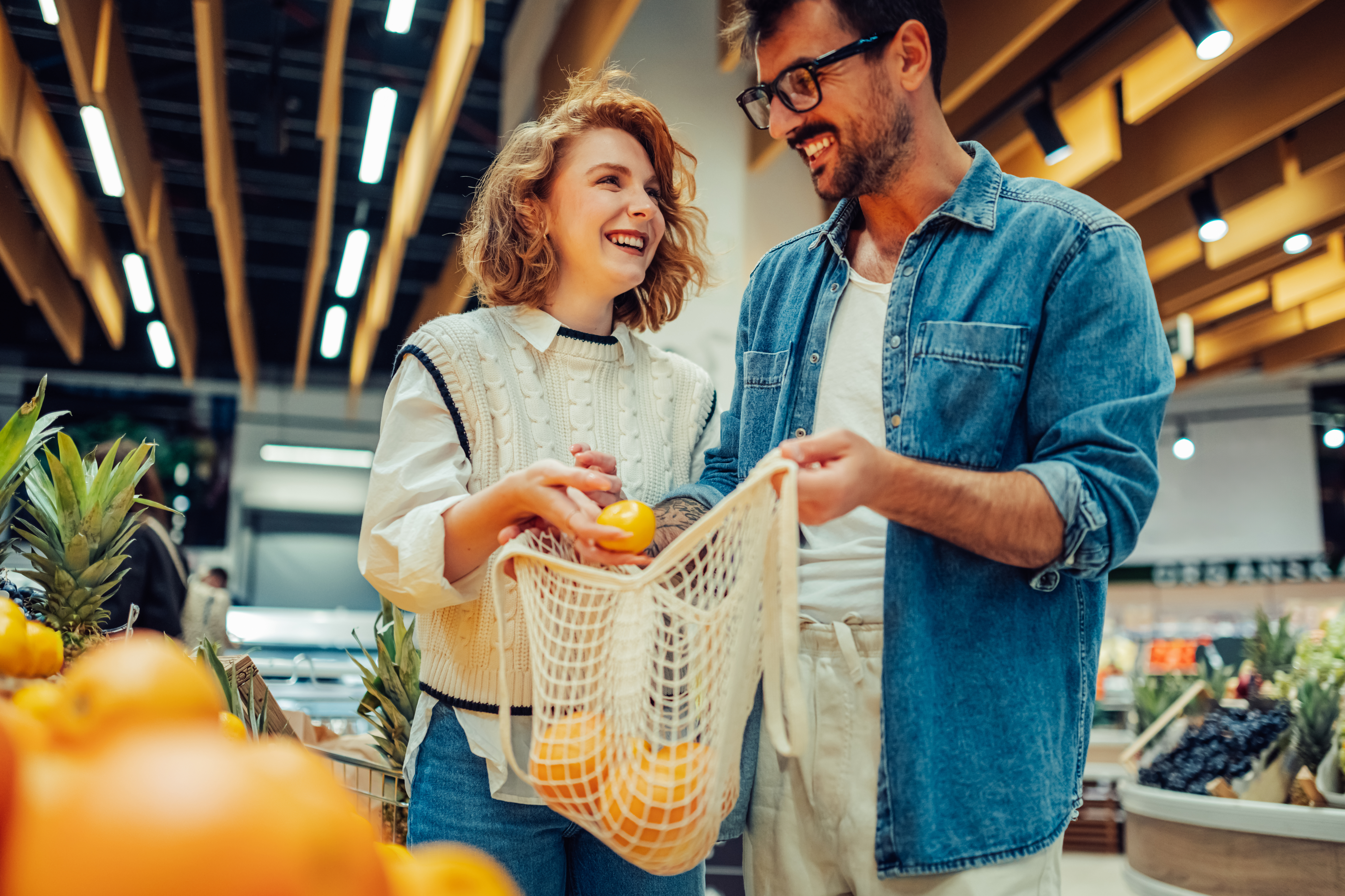 couple enjoying simple everyday things such as grocery shopping