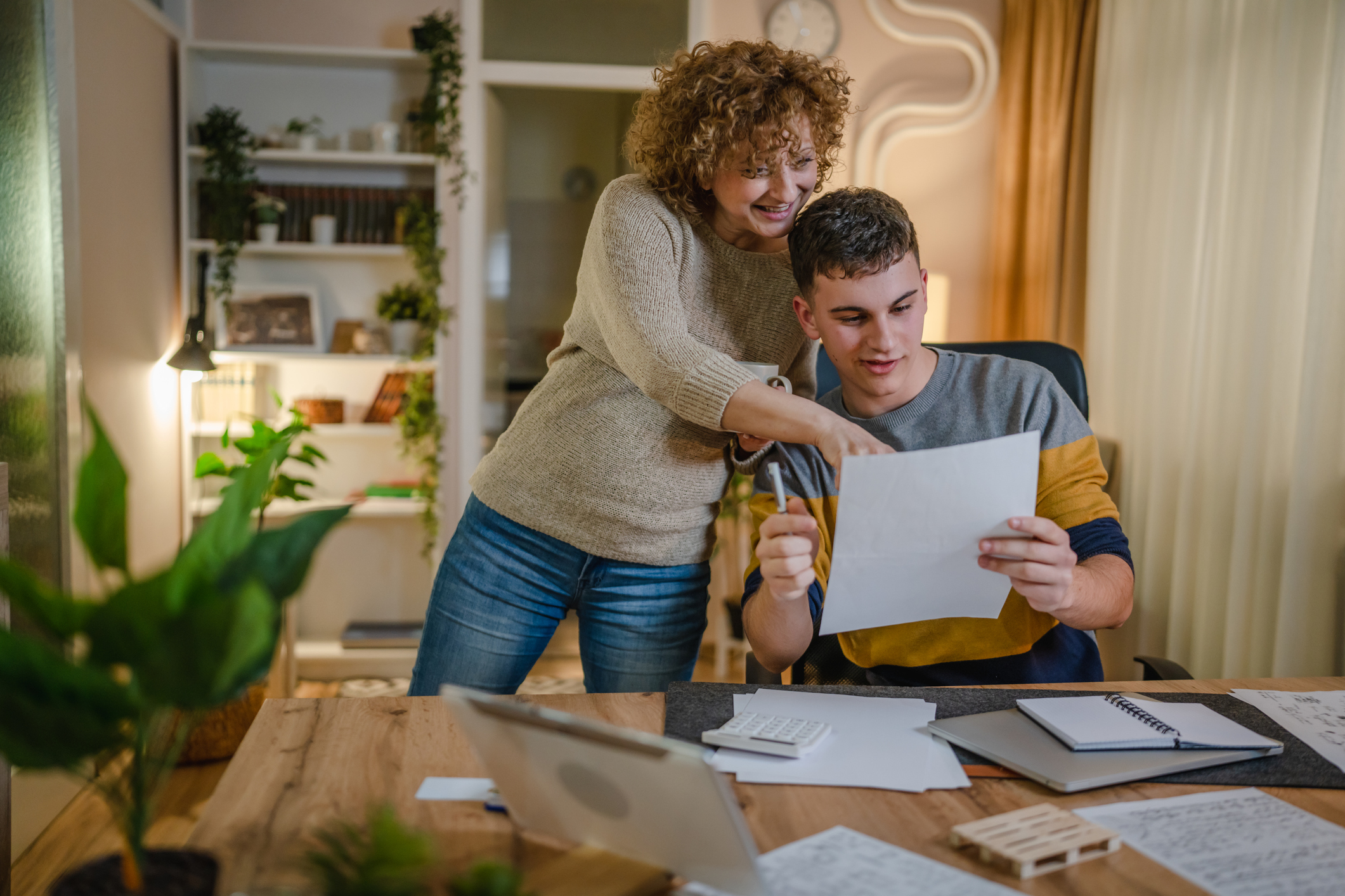 college student and parent looking at finances