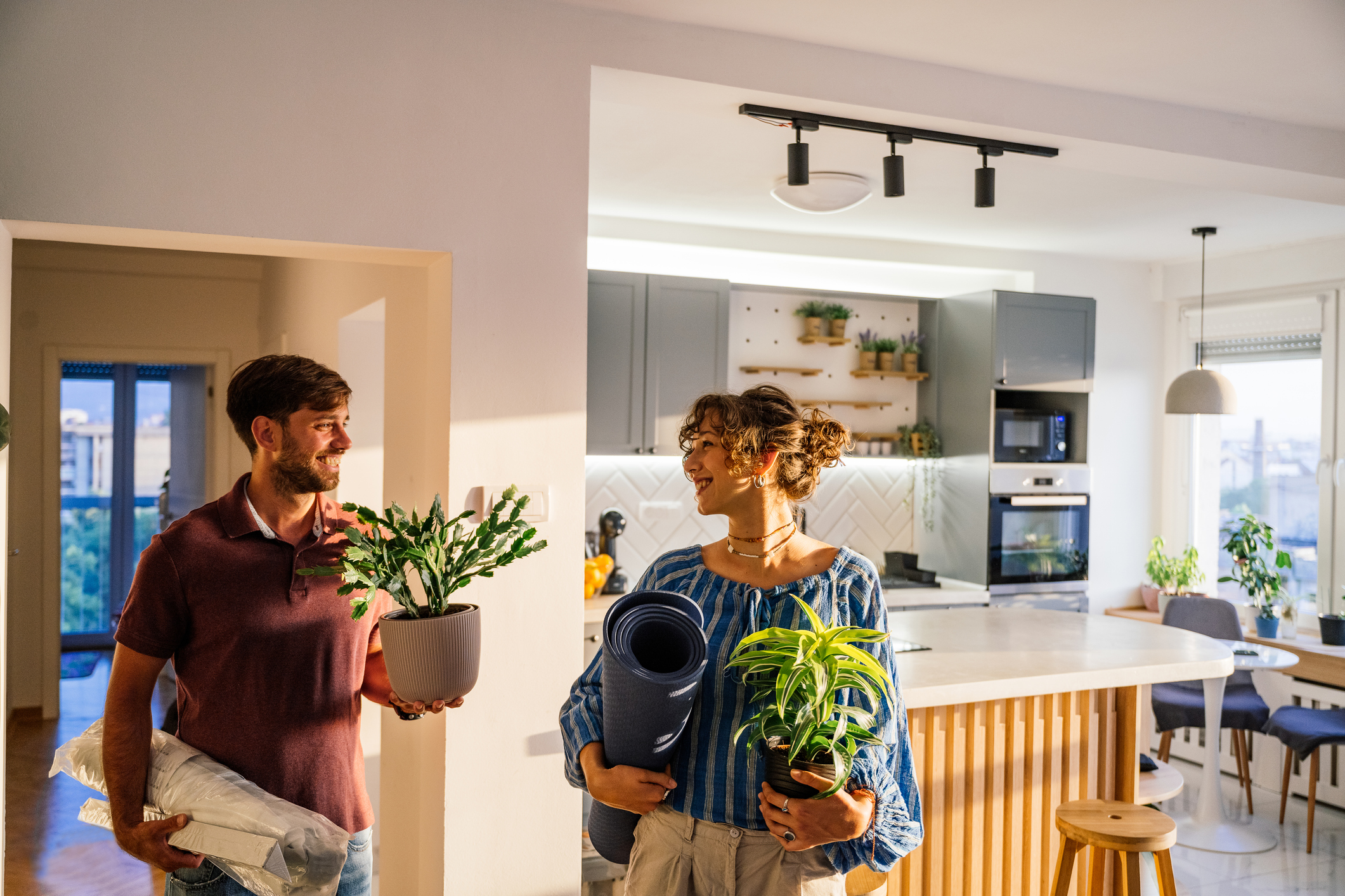 happy couple at their apartment