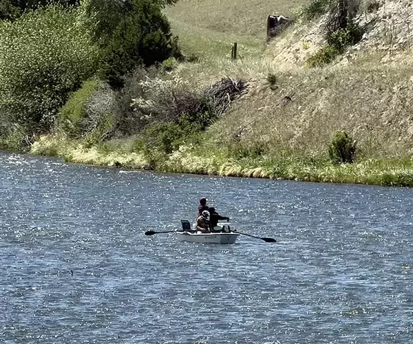 									Floating the yellowstone river while fly fishing in montana during june
															