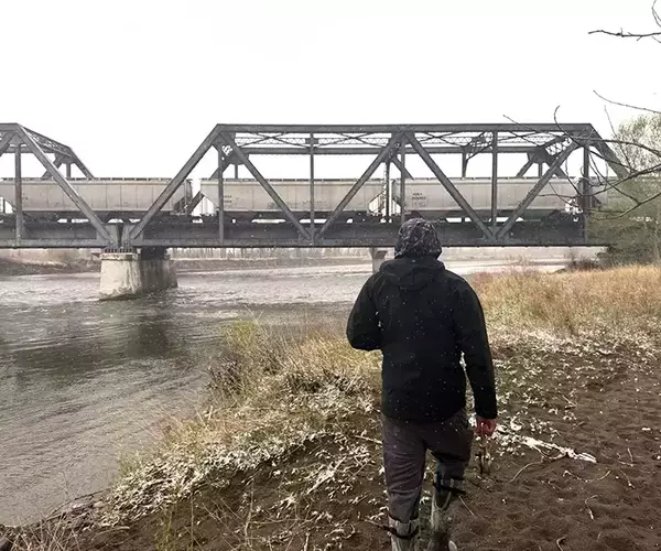 									Yellowstone river fly fishing in montana park street bridge
															
