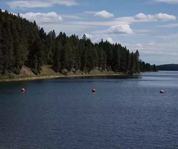 									Hebgen lake fly fishing in montana dam sideview
															